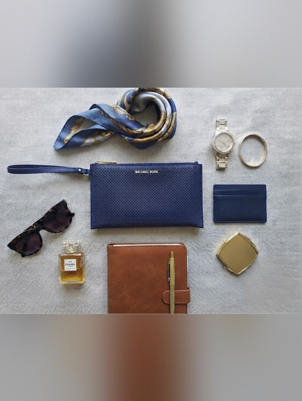 Michael Kors Navy Blue Perforated Wristlet Clutch with Silver-Tone Hardware